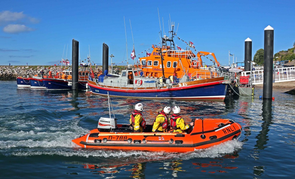 Torbay's new D class lifeboat with the all-weather lifeboat and old lifeboats in the background © RNLI